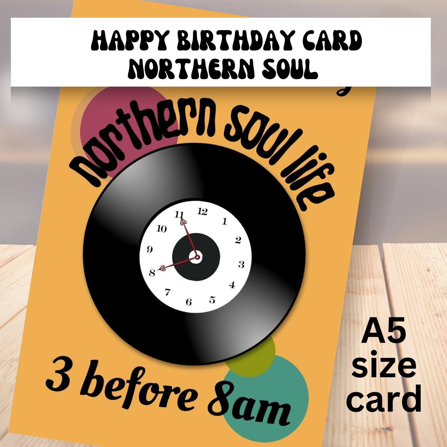 Northern soul theme Happy Birthday card with vinyl record design and text on a wooden surface and the phrase 3 before 8