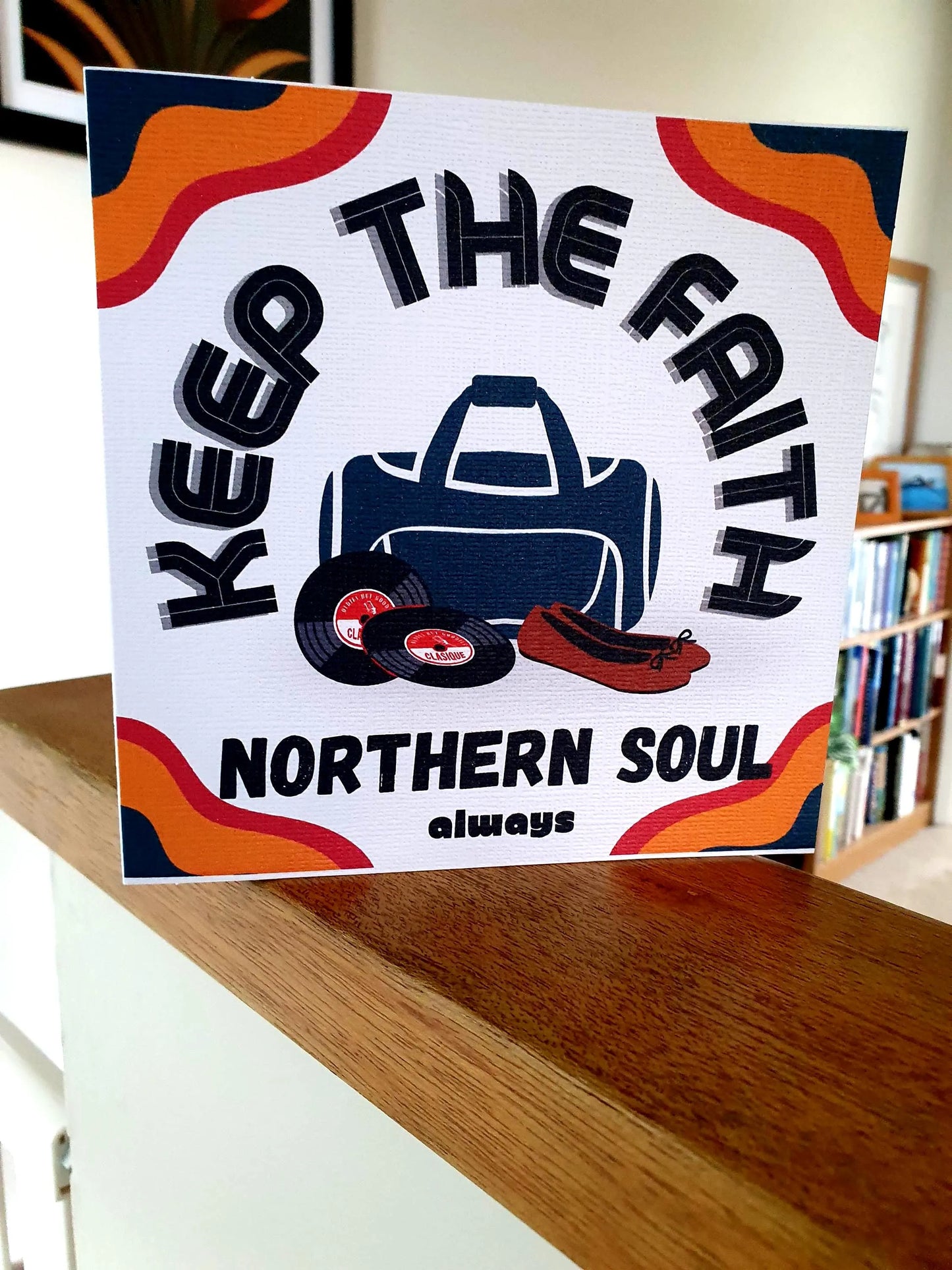 Birthday card  with 'Keep the Faith Northern Soul always' text and graphics on a wooden surface.