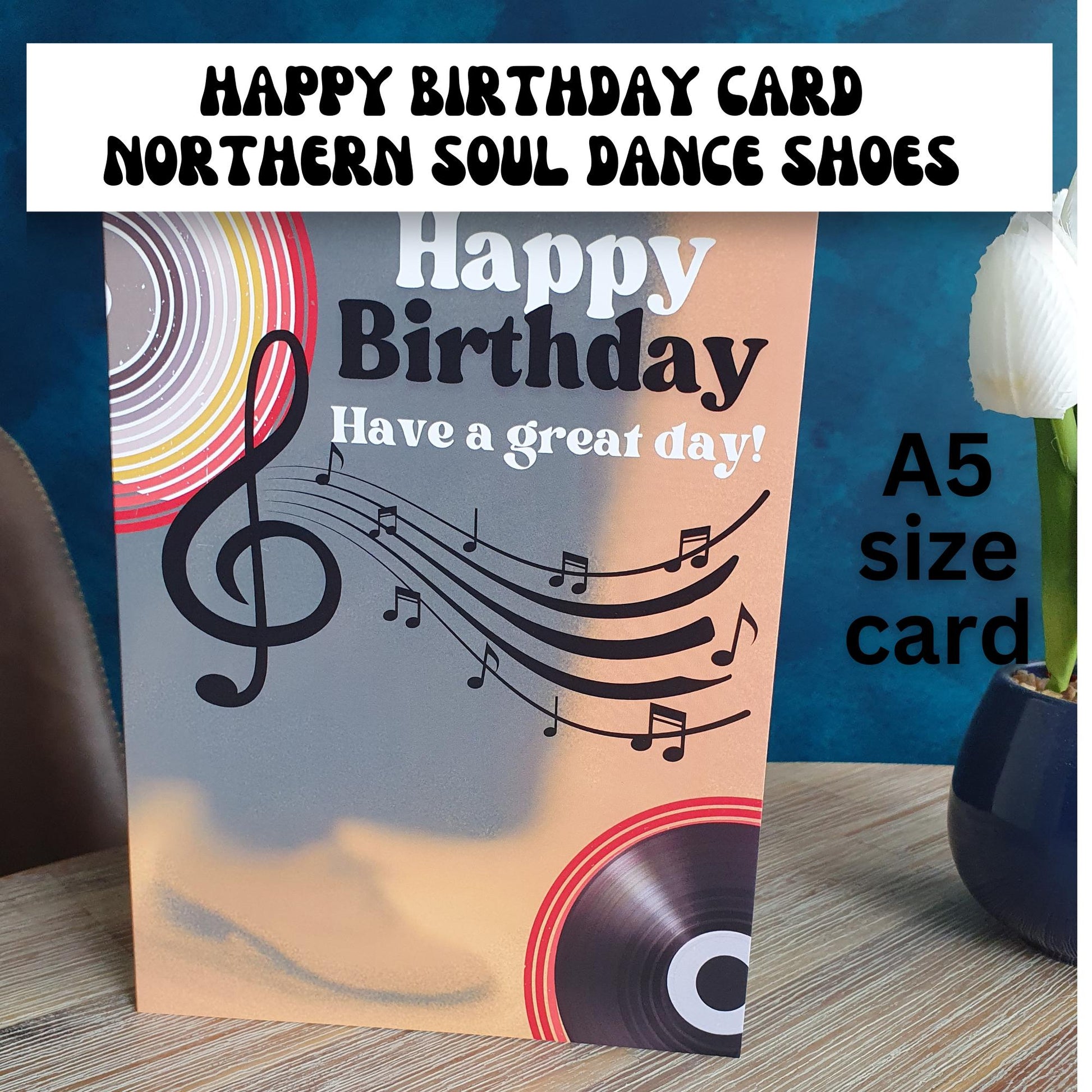 Happy Birthday card with mens trousers and shoes and music notes and record design on a wooden surface text expains the card is A5