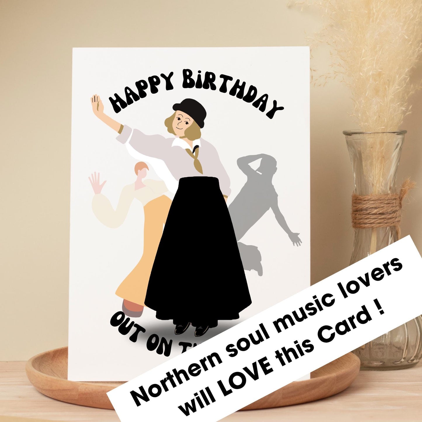 Birthday card with illustration of a person dancing and text 'Happy Birthday' on a beige background.