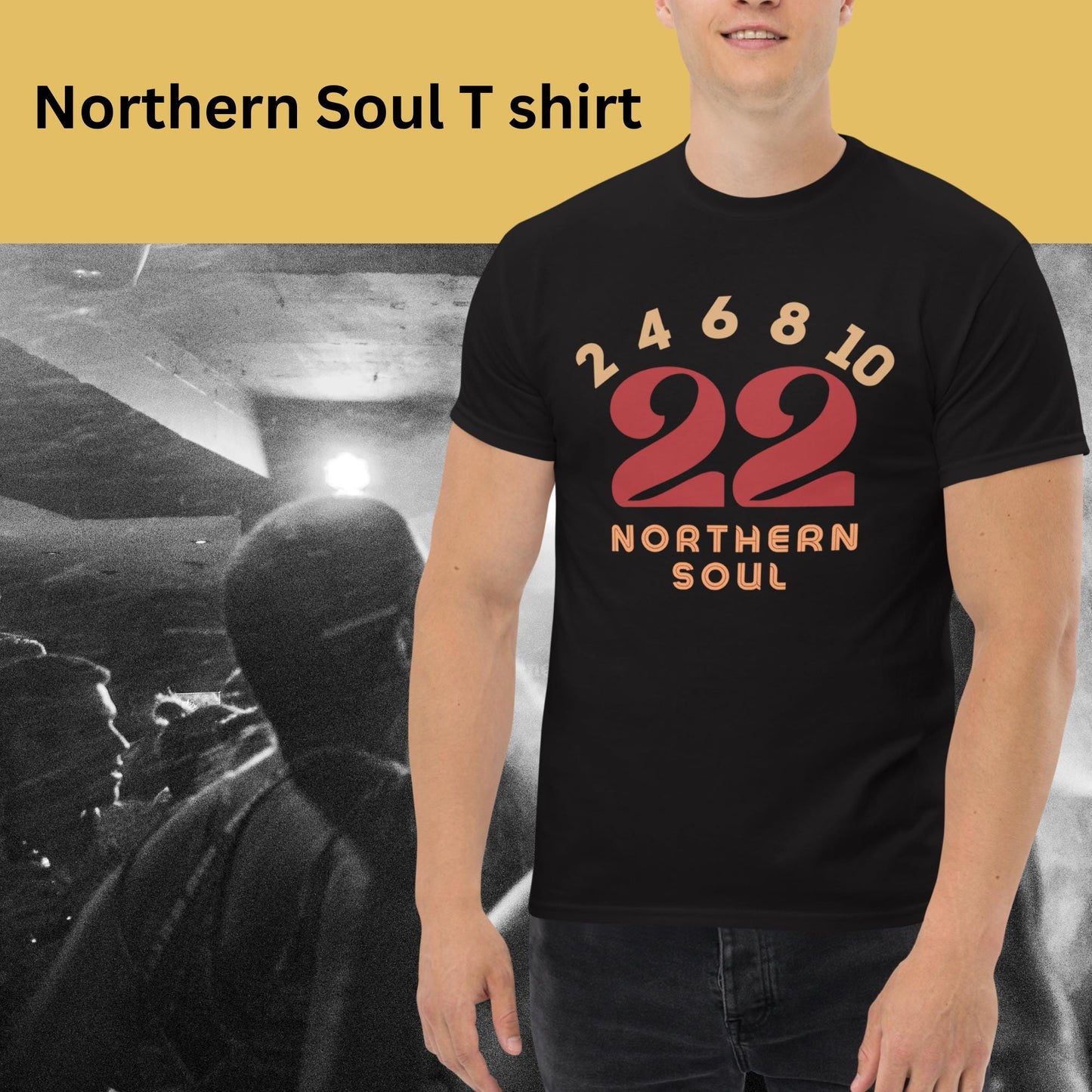 Person wearing a black 'Northern Soul T shirt' with red and yellow numbers 2 4 6 8 10