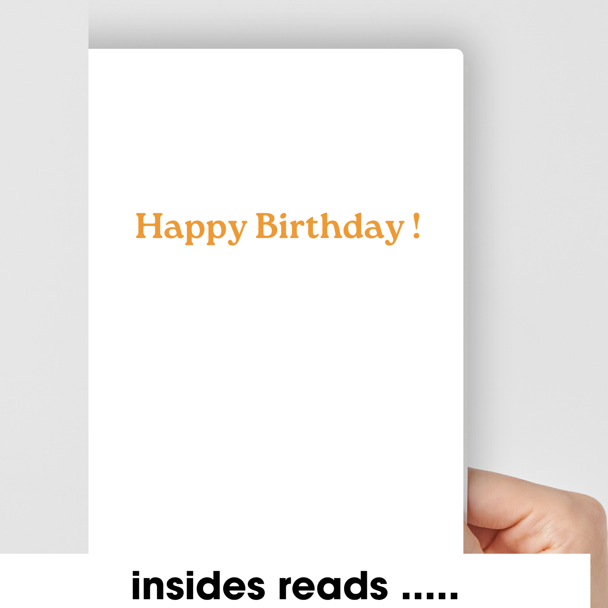 The inner of an A5 card being hand held with the words Happy Birthday !