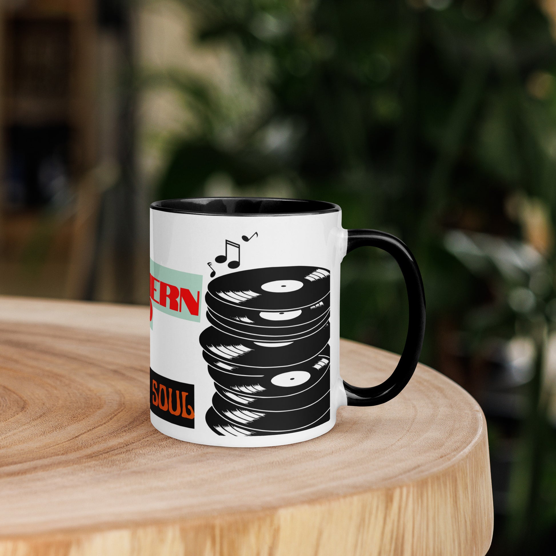 Mug with vinyl record design and nothern soul theme on a wooden surface
